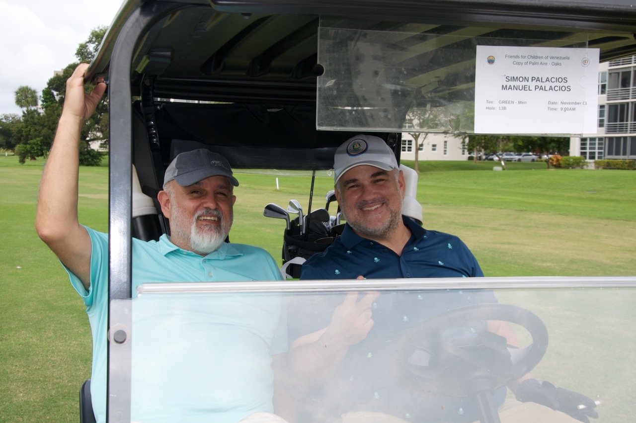 Simon and Manuel Palacios in their cart at the Oaks Course
