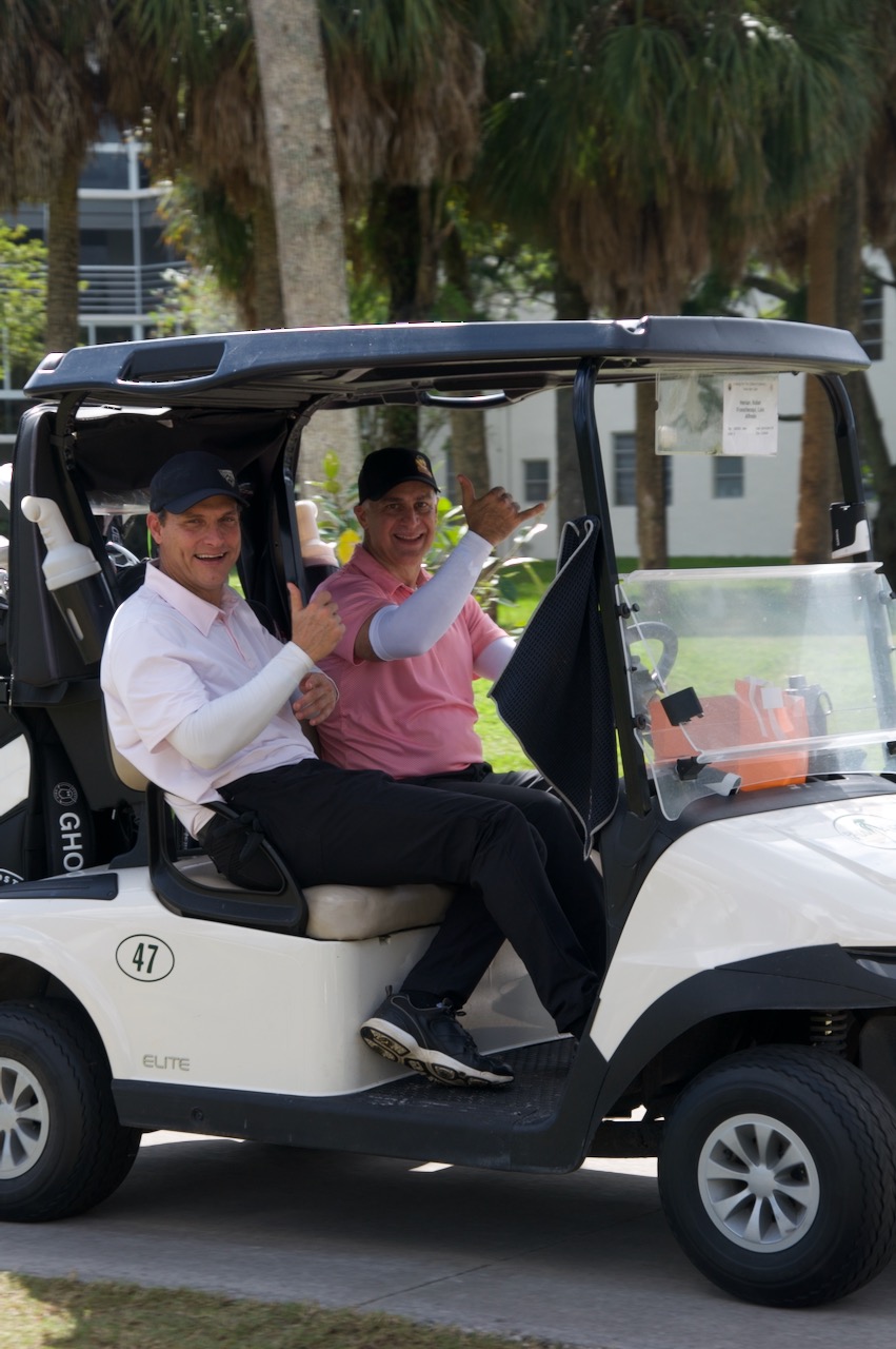 Two players heading out in cart 47