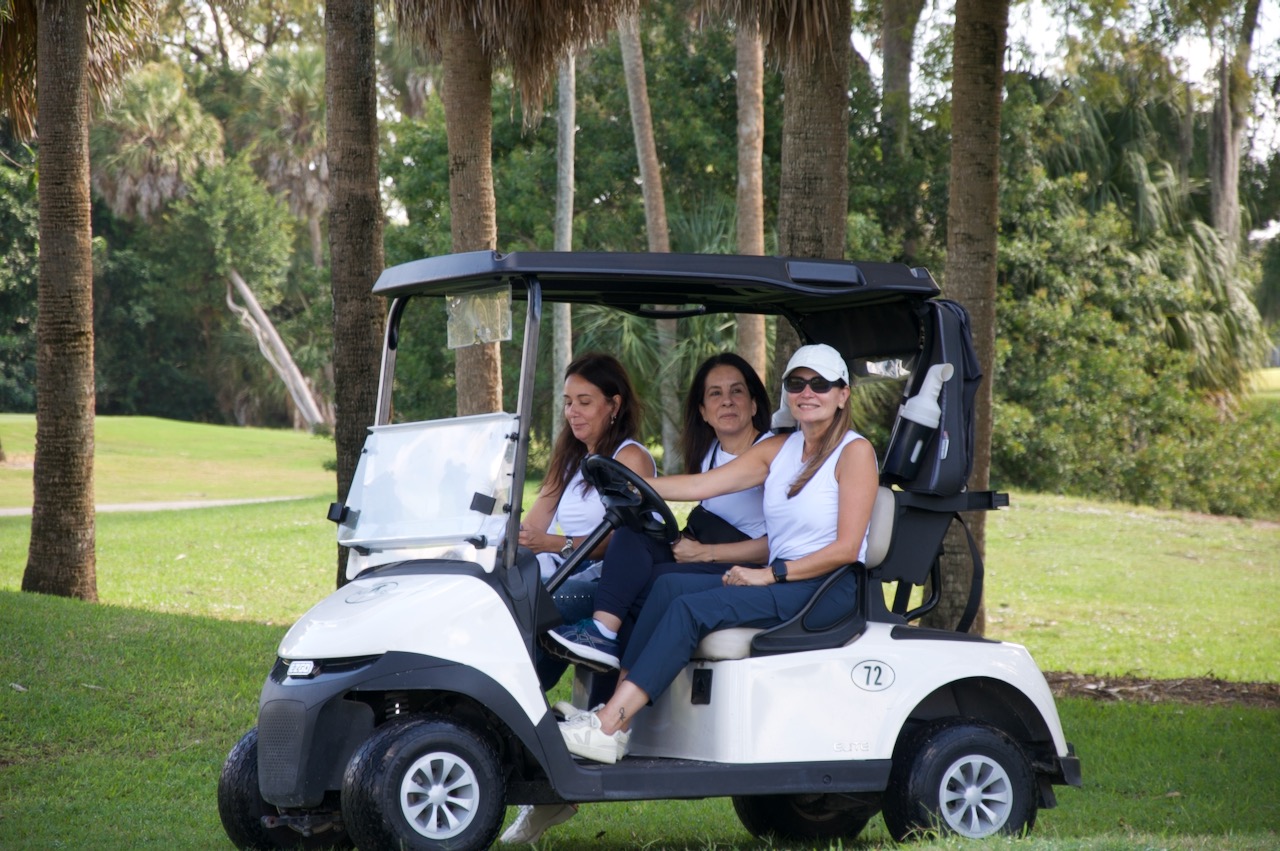 Players riding out in cart 72