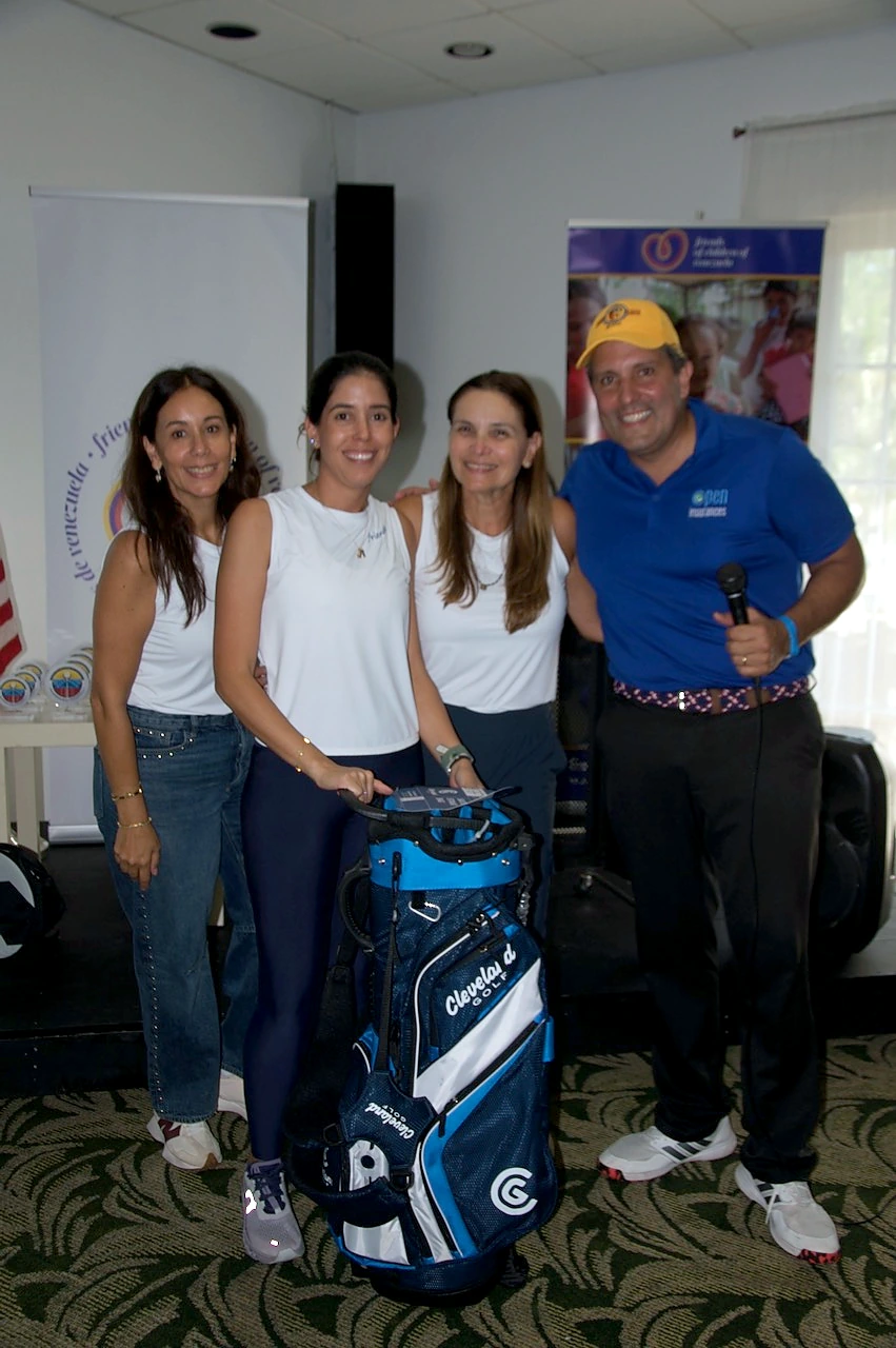 Winners with the Cleveland golf bag prize